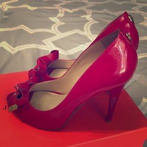 Hot pink patent peep toe heels